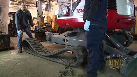 mini excavator track|installing track on mini excavator.